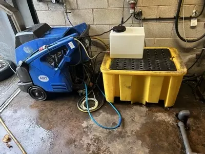 Original Nilfisk Neptune 7 setup previously used for fleet cleaning operations before installation of the new static SH Truck system. The older setup had ongoing scaling issues and limited long-term suitability for the customer&rsquo;s growing requirements.
